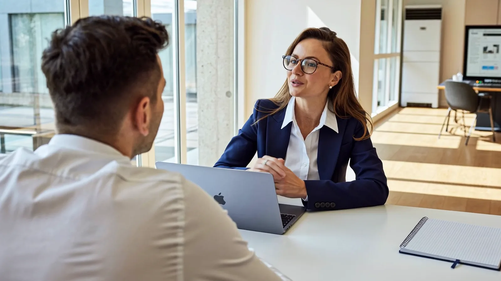A DreamSoft AI lead in conversation with a client